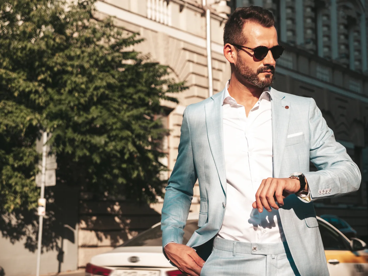 A man on a city street at golden hour