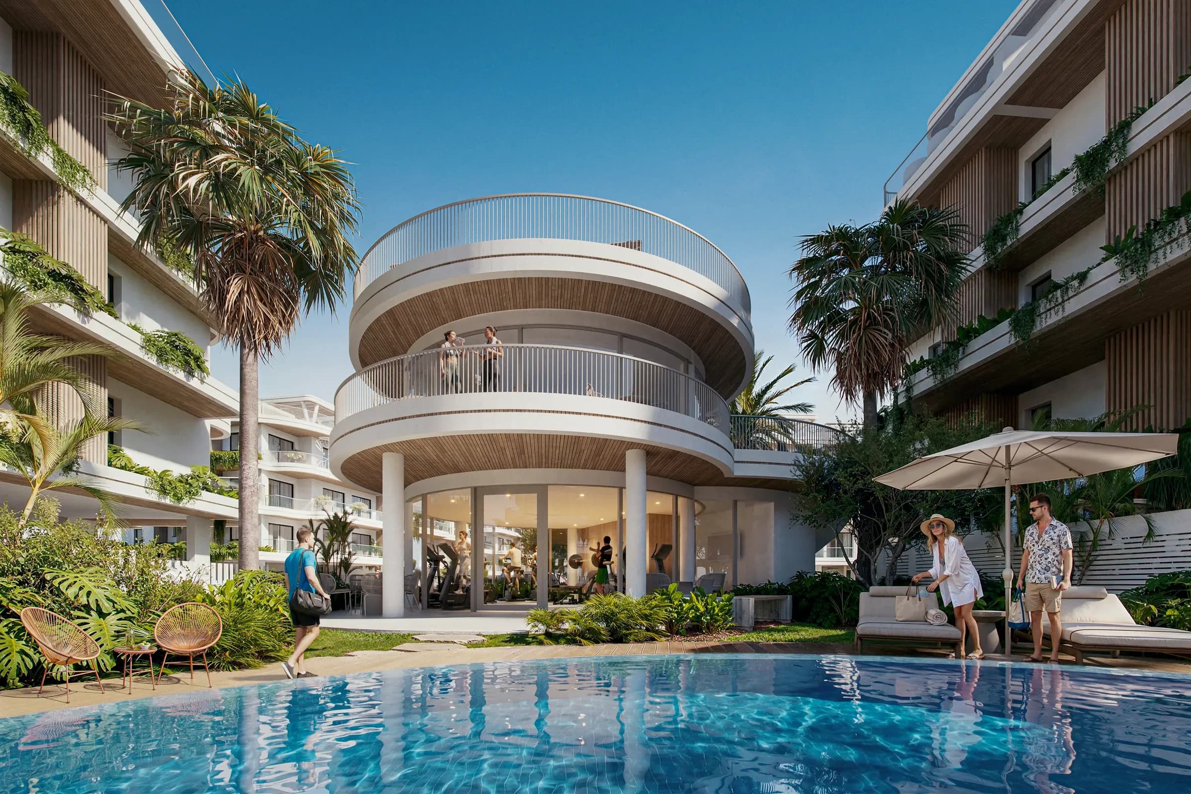 The curved clubhouse at Zin Residences, beside the pool