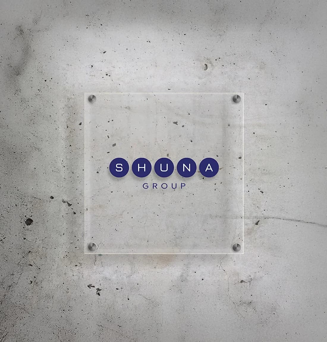 The Shuna Group mark on a glass panel